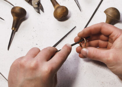 a jeweler repairing a ring